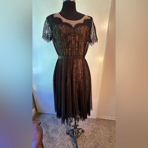 Elegant black lace dress. Worn for 1 event only. Almost brand new.